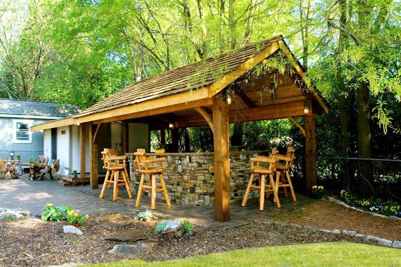 An outdoor kitchen made out of cedar wood in Atlanta