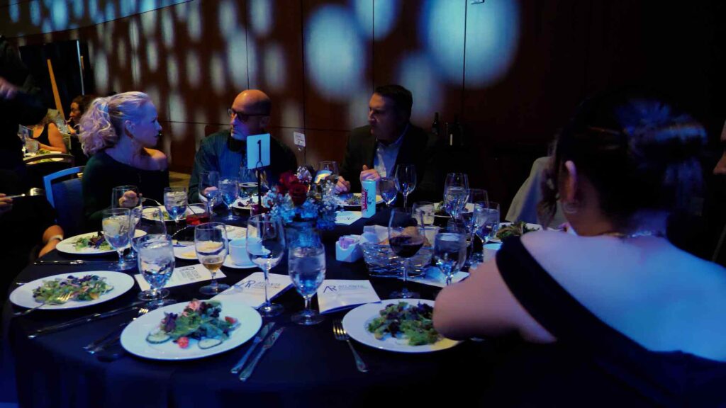 People seated at a table, celebrating the Five NARI Atlanta Design Awards in Atlanta, GA. 