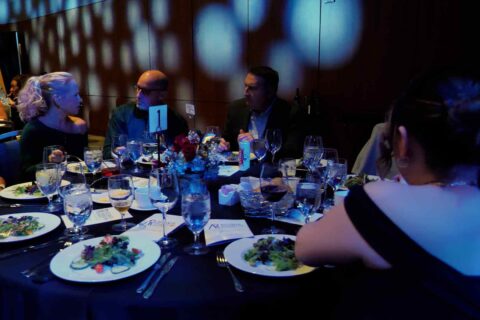 People seated at a table, celebrating the Five NARI Atlanta Design Awards in Atlanta, GA.